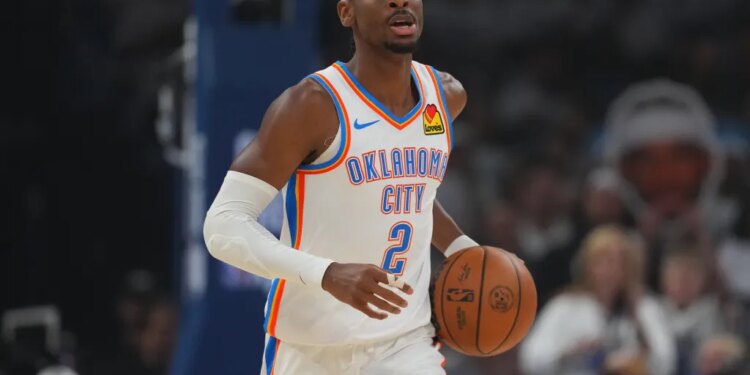 Oklahoma City Thunder guard Shai Gilgeous-Alexander (2) moves on court in the first half of Game 5 in the Western Conference finals NBA basketball playoffs series against the San Antonio Spurs, Tuesday, May 26, 2026, in Oklahoma City. (AP Photo/Julio Cortez)