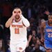 New York Knicks guard Jalen Brunson (11) reacts as he runs down court after hitting a three-point shot during the third quarter.