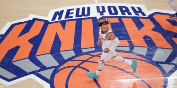 New York Knicks guard Jalen Brunson (11) runs down court.