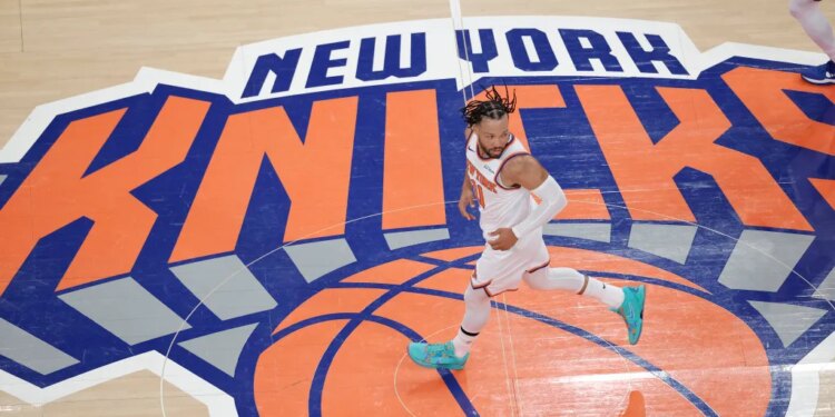 New York Knicks guard Jalen Brunson (11) runs down court.