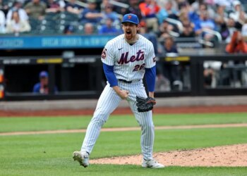 New York Mets pitcher Nolan McLean #26 reacts after getting Detroit Tigers shortstop Kevin McGonigle #7 to strike out looking, ending the 7th inning.