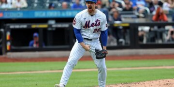 New York Mets pitcher Nolan McLean #26 reacts after getting Detroit Tigers shortstop Kevin McGonigle #7 to strike out looking, ending the 7th inning.