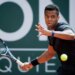Giovanni Mpetshi Perricard returns a ball during the ATP 250 Geneva Open tournament.