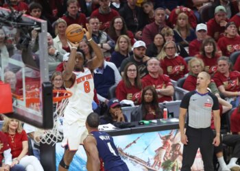 New York Knicks forward Og Anunoby #8 shooting a 3-point shot against the Cleveland Cavaliers.
