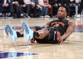 Knicks forward Og Anunoby (8) falls to the court after missing a shot against the Philadelphia 76ers during game five of the second round of the 2026 NBA Playoffs at Madison Square Garden