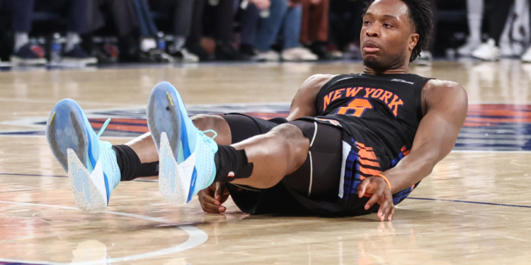 Knicks forward Og Anunoby (8) falls to the court after missing a shot against the Philadelphia 76ers during game five of the second round of the 2026 NBA Playoffs at Madison Square Garden