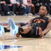 Knicks forward Og Anunoby (8) falls to the court after missing a shot against the Philadelphia 76ers during game five of the second round of the 2026 NBA Playoffs at Madison Square Garden