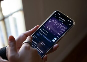 Person looking at daytime stress metrics in the Oura app.