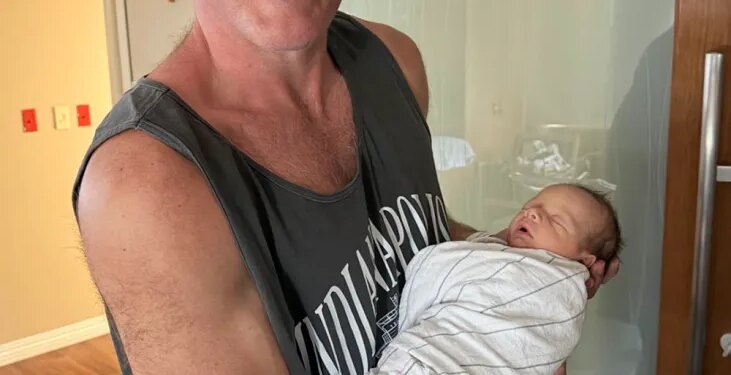 ESPN personality Pat McAfee and his wife Samantha welcomed their son, Midas Robert, after she underwent an emergency C-section on Friday, May 22, 2026.
