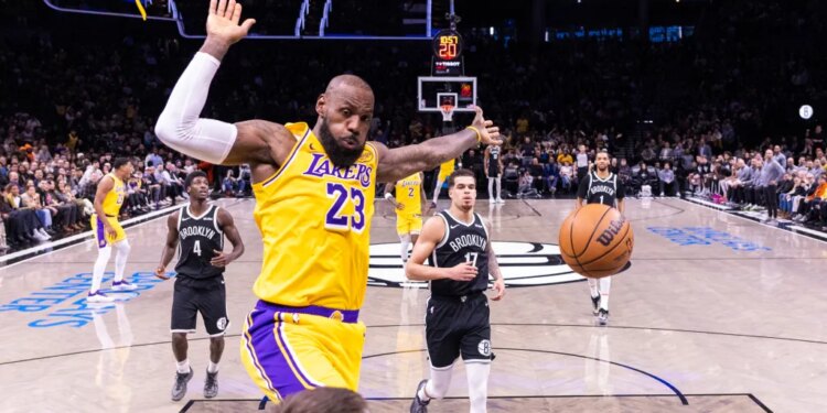 LeBron James of the Los Angeles Lakers slams the ball during the first half at Barclays Center, Tuesday, Feb. 3, 2026, in Brooklyn, NY.