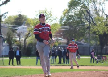Jaxson Torres pitches for Plainedge High School.