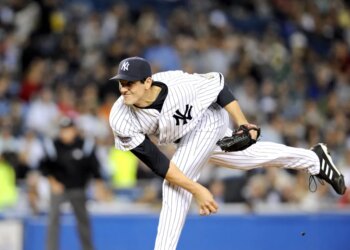 Yankees pitcher Carl Pavano pitches in the first inning.