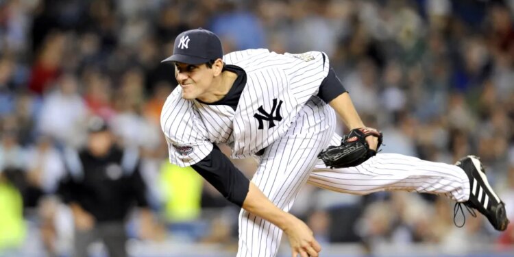 Yankees pitcher Carl Pavano pitches in the first inning.