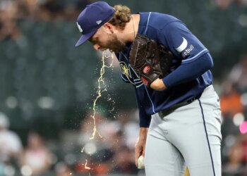 Tampa Bay Rays pitcher Jonathan Heasley (68) spits on the mound during a game against the Baltimore Orioles.