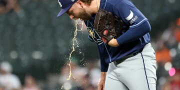 Tampa Bay Rays pitcher Jonathan Heasley (68) spits on the mound during a game against the Baltimore Orioles.