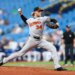 Baltimore Orioles pitcher Shane Baz throws a pitch.