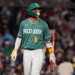 Boston Red Sox player Marcelo Mayer walks off the field after striking out.