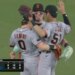 Three Giants outfielders celebrate their 9-3 win over the Dodgers.