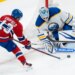 Montreal Canadiens' Cole Caufield scores on Buffalo Sabres goaltender Ukko-Pekka Luukkonen.