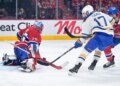 May 12, 2026; Montreal, Quebec, CAN; Montreal Canadiens goalie Jakub Dobes (75) stops Buffalo Sabres forward Jason Zucker (17) during the second period in game four of the second round of the 2026 Stanley Cup Playoffs at Bell Centre. Mandatory Credit: Eric Bolte-Imagn Images
