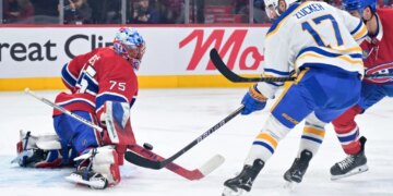 May 12, 2026; Montreal, Quebec, CAN; Montreal Canadiens goalie Jakub Dobes (75) stops Buffalo Sabres forward Jason Zucker (17) during the second period in game four of the second round of the 2026 Stanley Cup Playoffs at Bell Centre. Mandatory Credit: Eric Bolte-Imagn Images