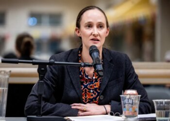Katie Wilson speaks at a climate forum.