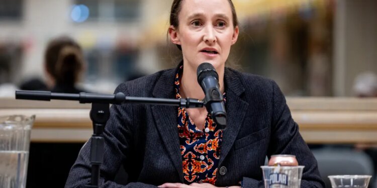 Katie Wilson speaks at a climate forum.