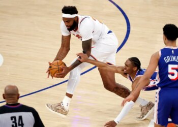 New York Knicks center Mitchell Robinson steals the ball from Philadelphia 76ers guard Tyrese Maxey (C) in the first half during the Eastern Conference Semifinals, game one in the first quarter at Madison Square Garden in New York, New York, USA, Monday, May 04, 2026