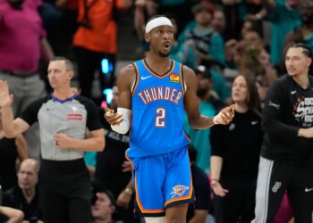 Shai Gilgeous-Alexander reacts during an NBA playoff game.