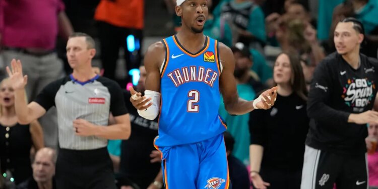 Shai Gilgeous-Alexander reacts during an NBA playoff game.