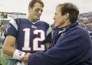Tom Brady gets congratulated by Patriots coach Bill Belichick after beating the Indianapolis Colts 44-13 , Sunday, Sept. 30, 2001 in Foxboro, Mass.