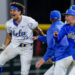 A jubilant Mulivai Levu (right) is set to get mobbed by teammates after hitting the game-winning 
sacrifice fly in the ninth inning of UCLA's 4-3 win over Purdue in the Big Ten quarterfinals on May 22, 2026 in Omaha, Neb.