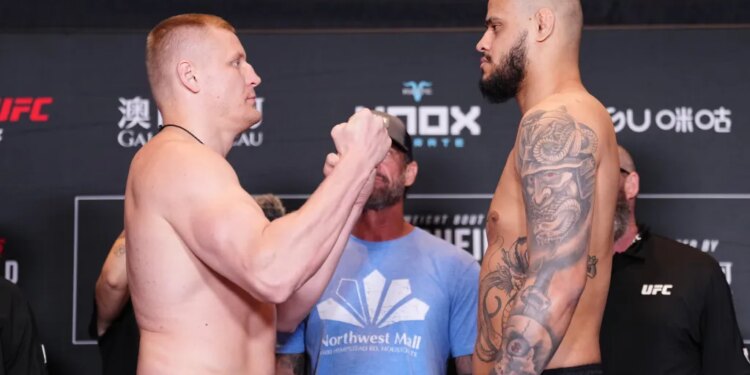 Sergei Pavlovich and Tallison Teixeira face off at the UFC Fight Night weigh-ins.