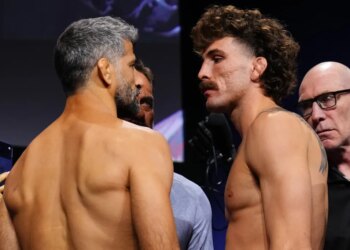 Beneil Dariush and Quillan Salkilld face off at the ceremonial weigh-in.