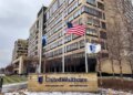 The UnitedHealthcare headquarters in Minnetonka, Minnesota, with flags at half-staff.