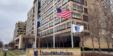 The UnitedHealthcare headquarters in Minnetonka, Minnesota, with flags at half-staff.