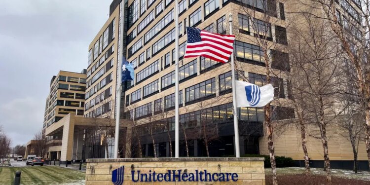 The UnitedHealthcare headquarters in Minnetonka, Minnesota, with flags at half-staff.