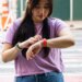 Person looking at Fitbit Charge 6 on their wrist.