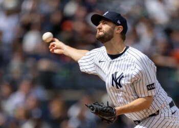 New York Yankees pitcher Jake Bird (59) throws a pitch against the Baltimore Orioles.