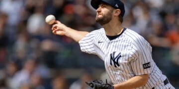 New York Yankees pitcher Jake Bird (59) throws a pitch against the Baltimore Orioles.