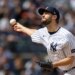 New York Yankees pitcher Jake Bird (59) throws a pitch against the Baltimore Orioles.