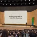 A picture of Demis Hassabis onstage at Google I/O 2026 with the screen behind him saying “A new golden age of scientific discovery”