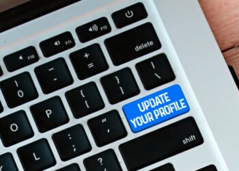 Laptop keyboard with update your profile button