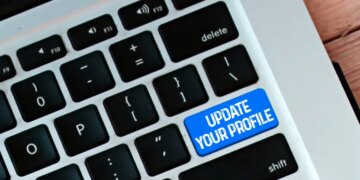 Laptop keyboard with update your profile button
