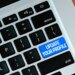 Laptop keyboard with update your profile button