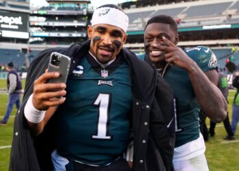 Philadelphia Eagles' Jalen Hurts and A.J. Brown pose for a photo.