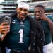 Philadelphia Eagles' Jalen Hurts and A.J. Brown pose for a photo.