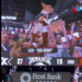 A corgi dressed in a jersey is held up by cheering fans at a basketball game, with the score Knicks 27, 19 in the second quarter.
