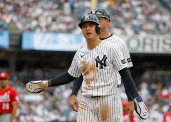New York Yankees shortstop Anthony Volpe reacts after being picked off first base.