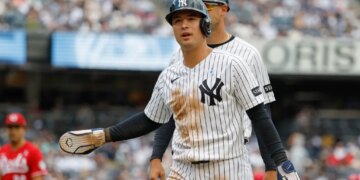 New York Yankees shortstop Anthony Volpe reacts after being picked off first base.